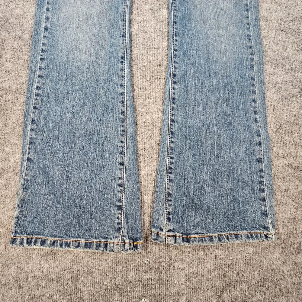 Vintage Levi's 542 Low Rise Flare Jeans Womens 12M Medium Wash Y2K Flap Pocket